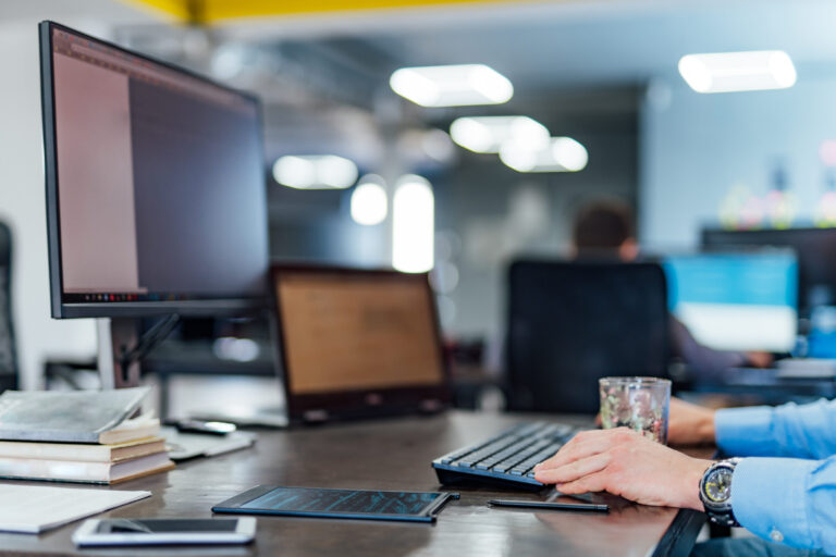 Tool of Professional Developer programmer working a software website design and coding technology. Writing codes and database in company office workforce management software symagic in gebruik